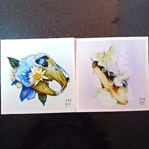 Set of 2 Animal Skulls with Flowers & Butterfly Prints.